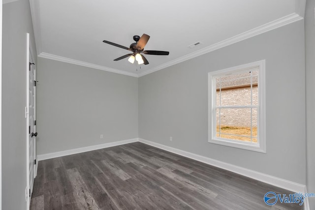 empty room featuring crown molding, dark hardwood / wood-style floors, and ceiling fan