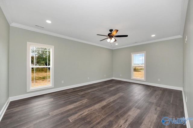 unfurnished room featuring ceiling fan, dark hardwood / wood-style floors, and plenty of natural light