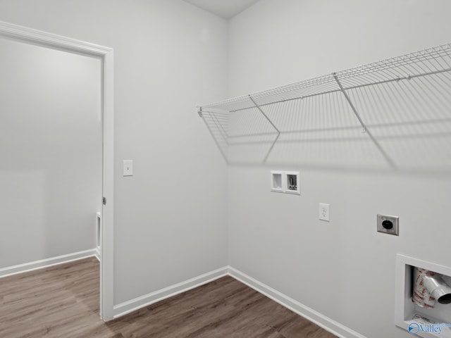 laundry room featuring hookup for an electric dryer, washer hookup, and hardwood / wood-style floors