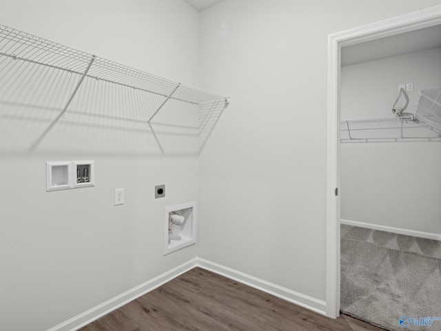 washroom with electric dryer hookup, dark hardwood / wood-style flooring, and washer hookup