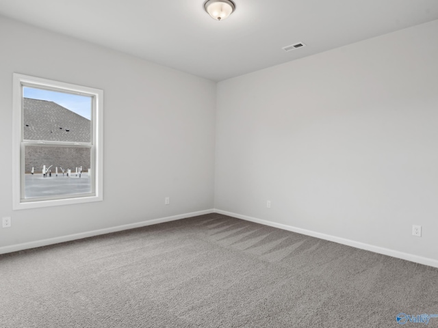 view of carpeted spare room