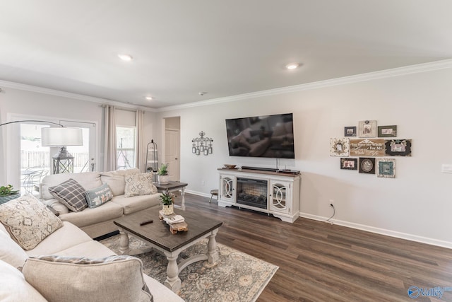 living room featuring recessed lighting, dark wood finished floors, crown molding, baseboards, and a fireplace