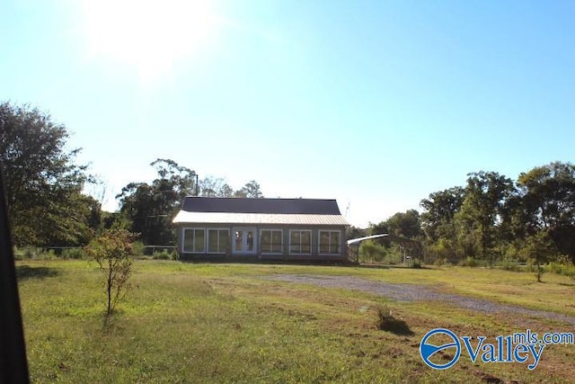 exterior space with a front yard