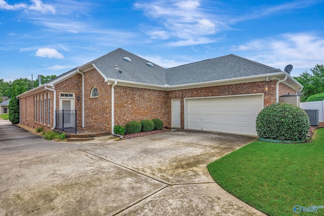 view of front of home featuring concrete driveway, brick siding, roof with shingles, and an attached garage