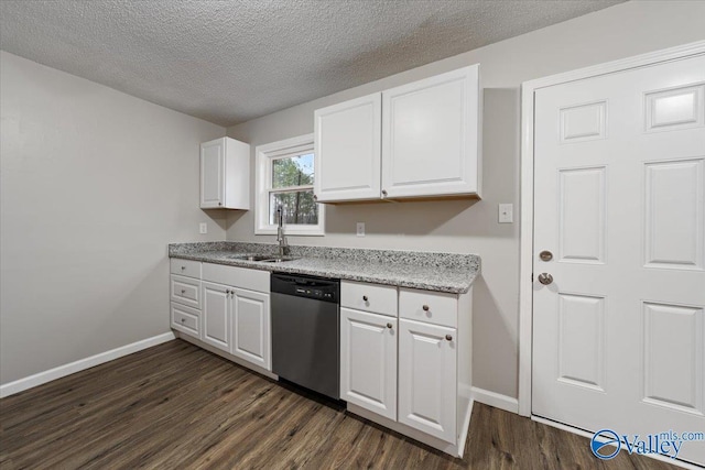 kitchen with sink, dark wood-type flooring, stainless steel dishwasher, and white cabinets