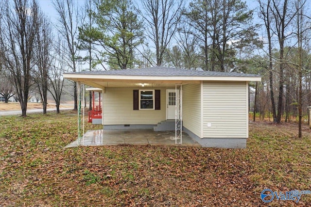 view of outdoor structure with a carport