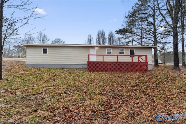 view of front of home featuring a wooden deck