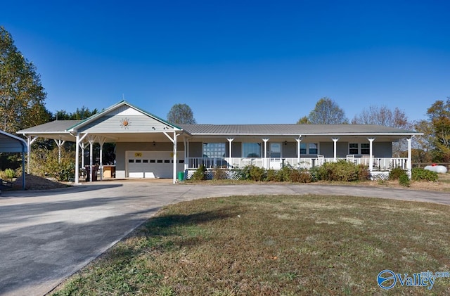 single story home featuring a front lawn, a garage, a carport, and a porch