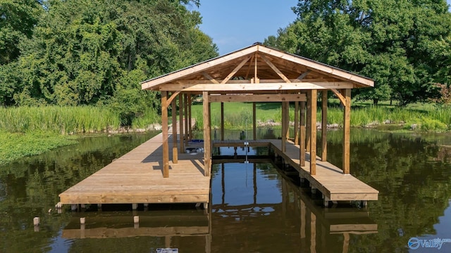 view of dock with a water view