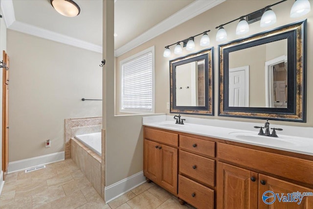 bathroom with ornamental molding, visible vents, a sink, and a relaxing tiled tub