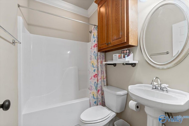 full bathroom featuring toilet, shower / bath combo, ornamental molding, and a sink