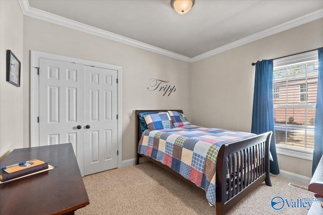 bedroom featuring multiple windows, carpet, and baseboards