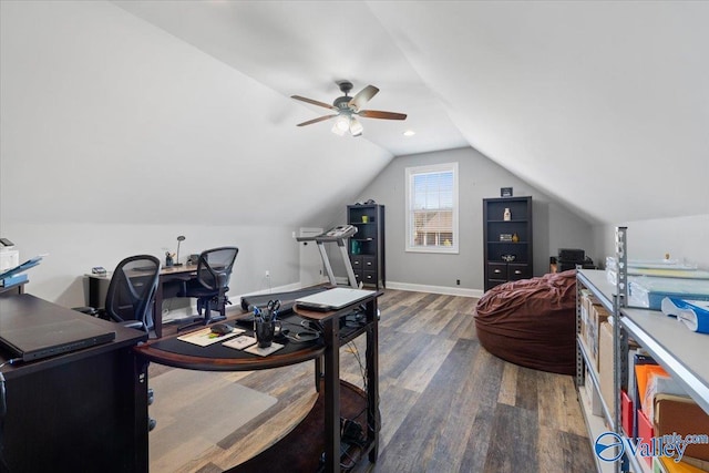 home office with a ceiling fan, lofted ceiling, baseboards, and wood finished floors