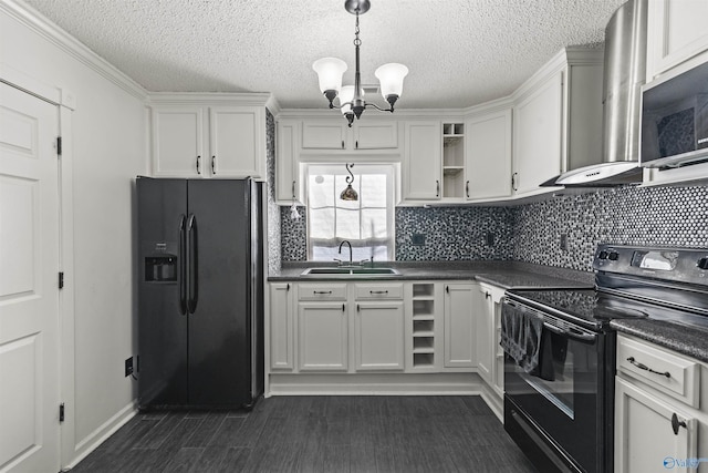 kitchen with white cabinetry, sink, black appliances, and wall chimney exhaust hood