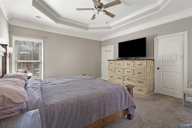 bedroom with light carpet, a raised ceiling, ceiling fan, and ornamental molding