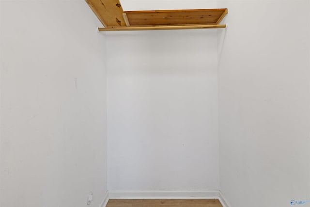 spacious closet featuring light wood finished floors