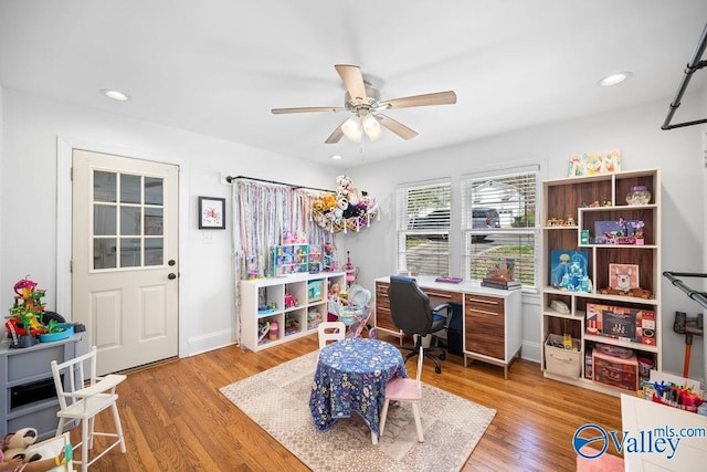 office area with recessed lighting, light wood-type flooring, and a ceiling fan