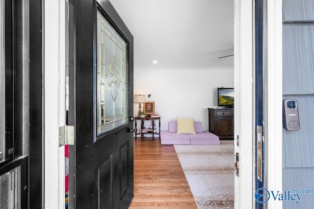 foyer featuring recessed lighting and wood finished floors