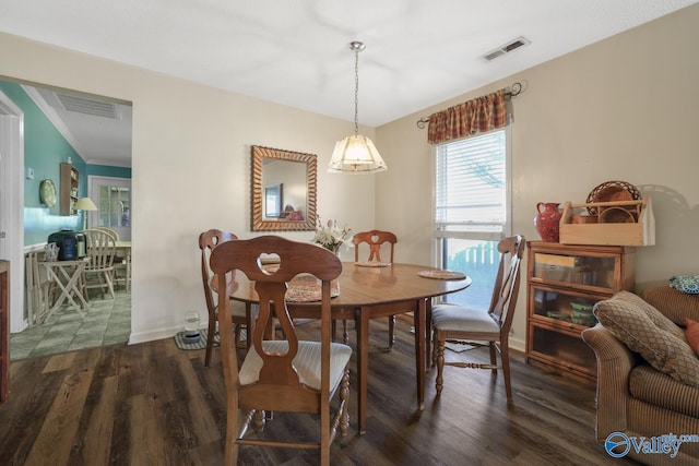 dining space with dark wood-type flooring