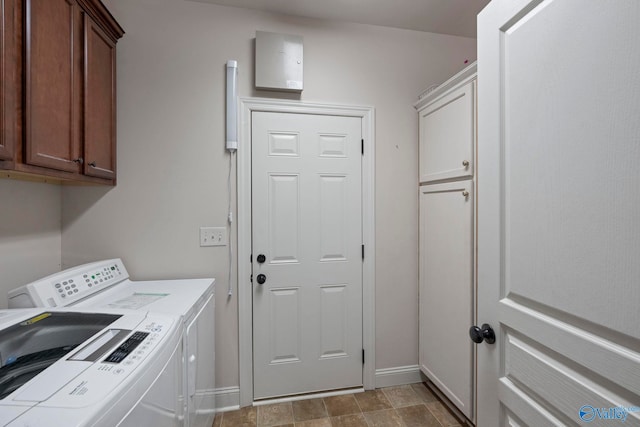 117 Somerset Park Dr NE, Huntsville, AL 35811 - washroom with washing machine and dryer, cabinet space, and baseboards