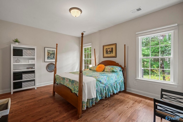117 Somerset Park Dr NE, Huntsville, AL 35811 - bedroom with wood finished floors, multiple windows, and baseboards
