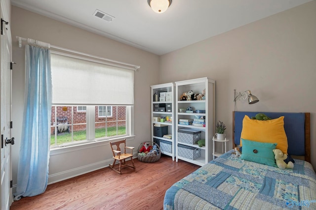117 Somerset Park Dr NE, Huntsville, AL 35811 - bedroom featuring wood finished floors and baseboards