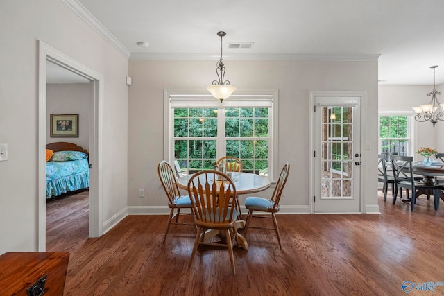117 Somerset Park Dr NE, Huntsville, AL 35811 - dining room with baseboards, wood finished floors, a chandelier, and ornamental molding