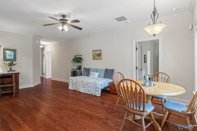 117 Somerset Park Dr NE, Huntsville, AL 35811 - dining area with a ceiling fan, crown molding, wood finished floors, and baseboards