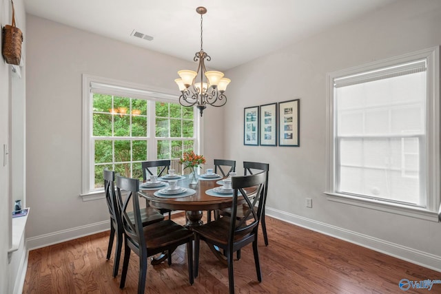 117 Somerset Park Dr NE, Huntsville, AL 35811 - dining space featuring a chandelier, healthy amount of natural light, and baseboards