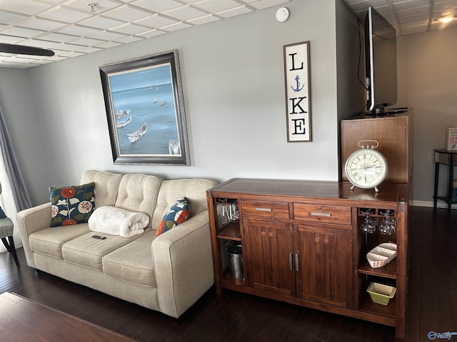 living room with dark hardwood / wood-style floors