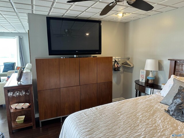 bedroom featuring dark wood-type flooring and ceiling fan