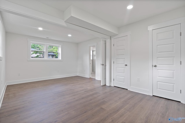 3631 NW Stag Run Dr, Huntsville, AL 35810 - unfurnished bedroom featuring wood finished floors, baseboards, and recessed lighting