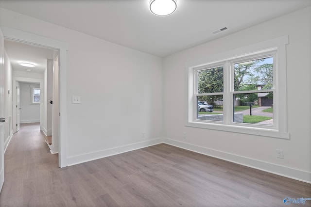 3631 NW Stag Run Dr, Huntsville, AL 35810 - spare room with wood finished floors and baseboards