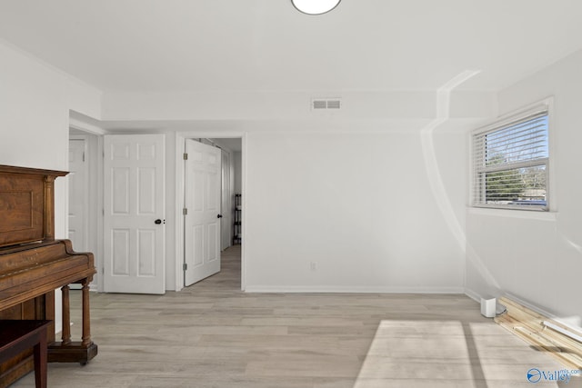 empty room featuring light wood-type flooring