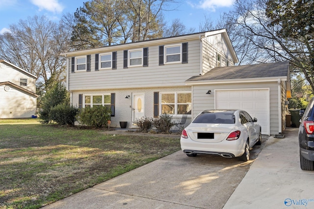 view of front of home with a garage and a front yard