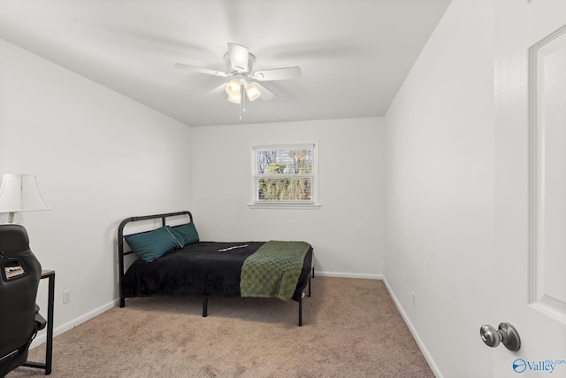 bedroom with light carpet and ceiling fan