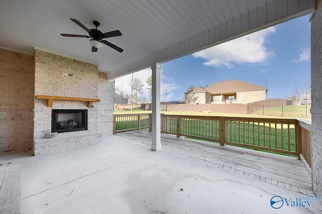 66 Natures Ridge Way, Huntsville, AL 35803 - view of patio / terrace featuring an outdoor brick fireplace, a ceiling fan, and a wooden deck