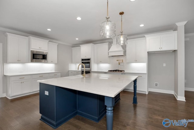 66 Natures Ridge Way, Huntsville, AL 35803 - kitchen featuring stainless steel appliances, decorative backsplash, premium range hood, white cabinetry, and recessed lighting