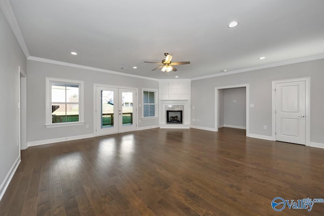 66 Natures Ridge Way, Huntsville, AL 35803 - unfurnished living room featuring ceiling fan, dark wood-style flooring, recessed lighting, crown molding, and a high end fireplace