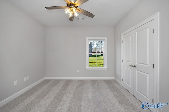 66 Natures Ridge Way, Huntsville, AL 35803 - unfurnished bedroom with carpet, ceiling fan, and a closet