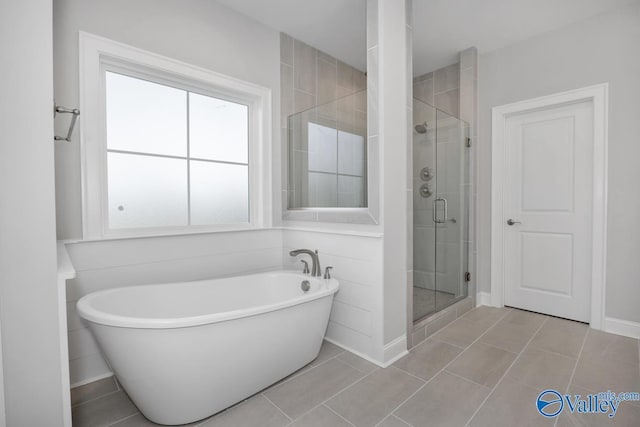 66 Natures Ridge Way, Huntsville, AL 35803 - full bath with a freestanding bath, a shower stall, and tile patterned floors