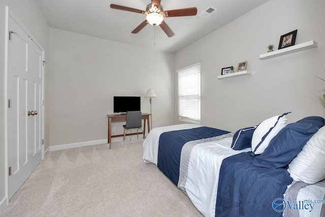 carpeted bedroom featuring ceiling fan