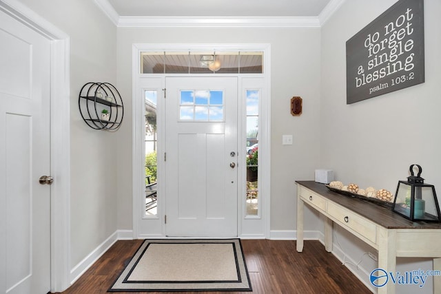 foyer entrance with ornamental molding and dark wood-type flooring