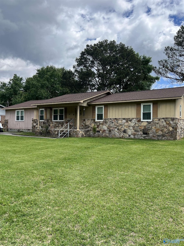 2143 Meadowood Dr, Southside, AL 35907 - single story home with stone siding, a front lawn, a porch, and board and batten siding