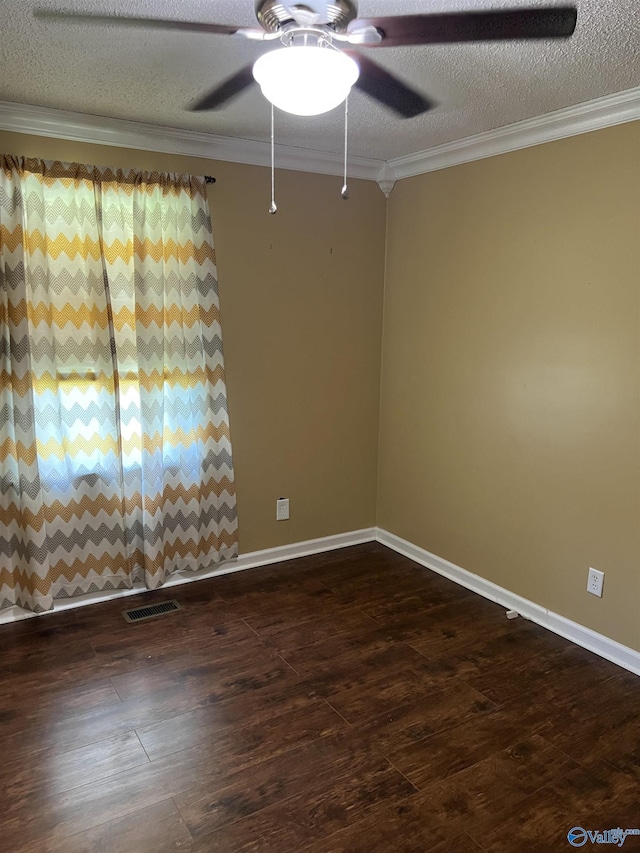 2143 Meadowood Dr, Southside, AL 35907 - spare room with baseboards, dark wood finished floors, ceiling fan, crown molding, and a textured ceiling