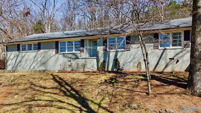 ranch-style home with brick siding