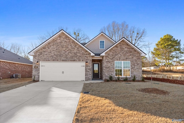 view of front of home with brick siding, concrete driveway, an attached garage, central AC unit, and a front yard