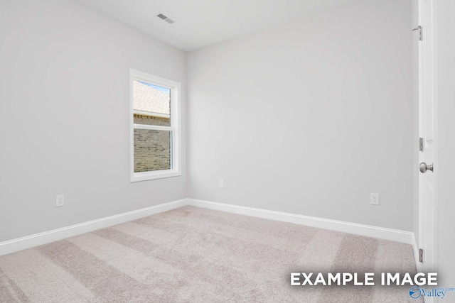 unfurnished room with carpet floors