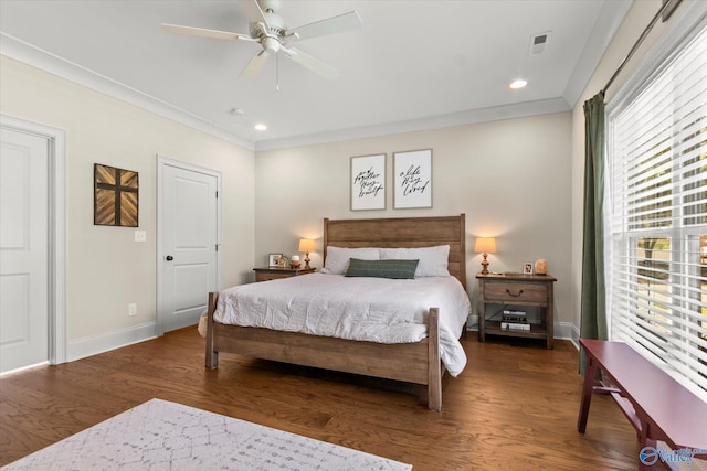 bedroom with ceiling fan, dark hardwood / wood-style flooring, and ornamental molding