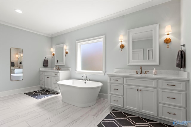 bathroom with vanity, a tub to relax in, and crown molding